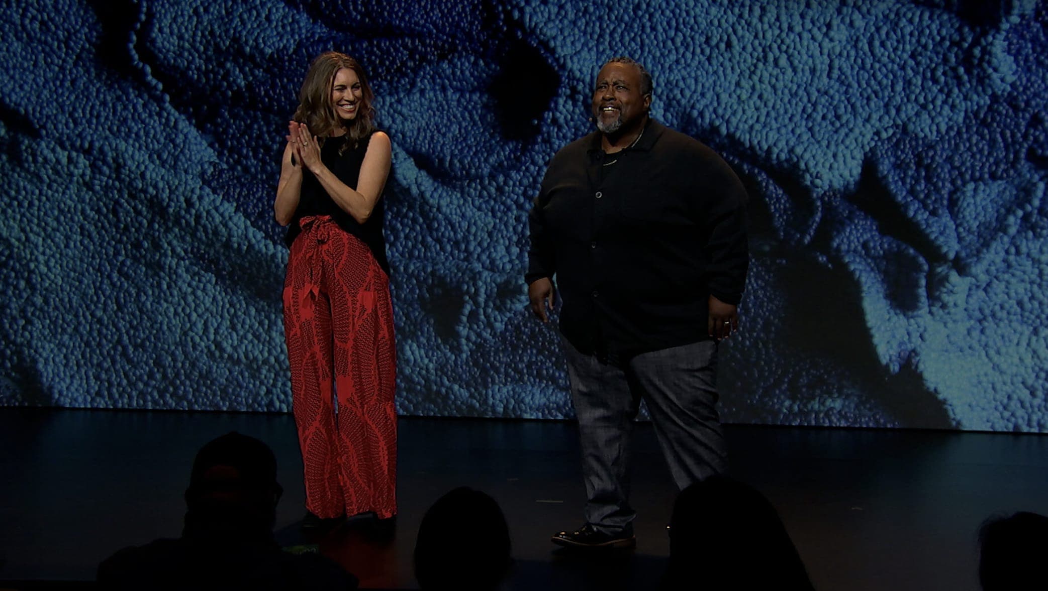 Dawn Lippert and Craig Nash standing on the stage of Demo Day 2023