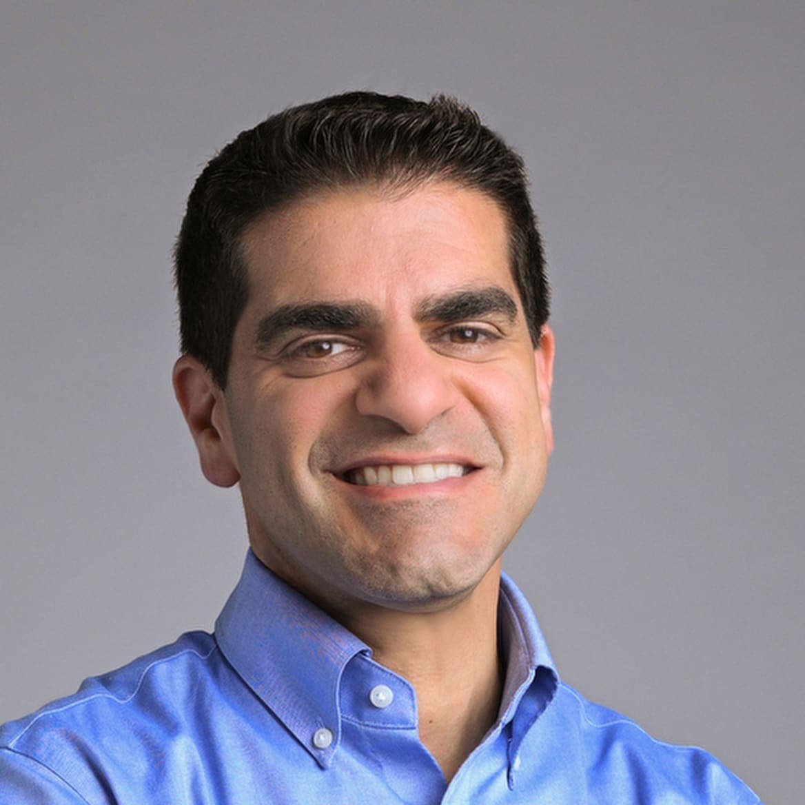 Waist up image of Armen Berjikly