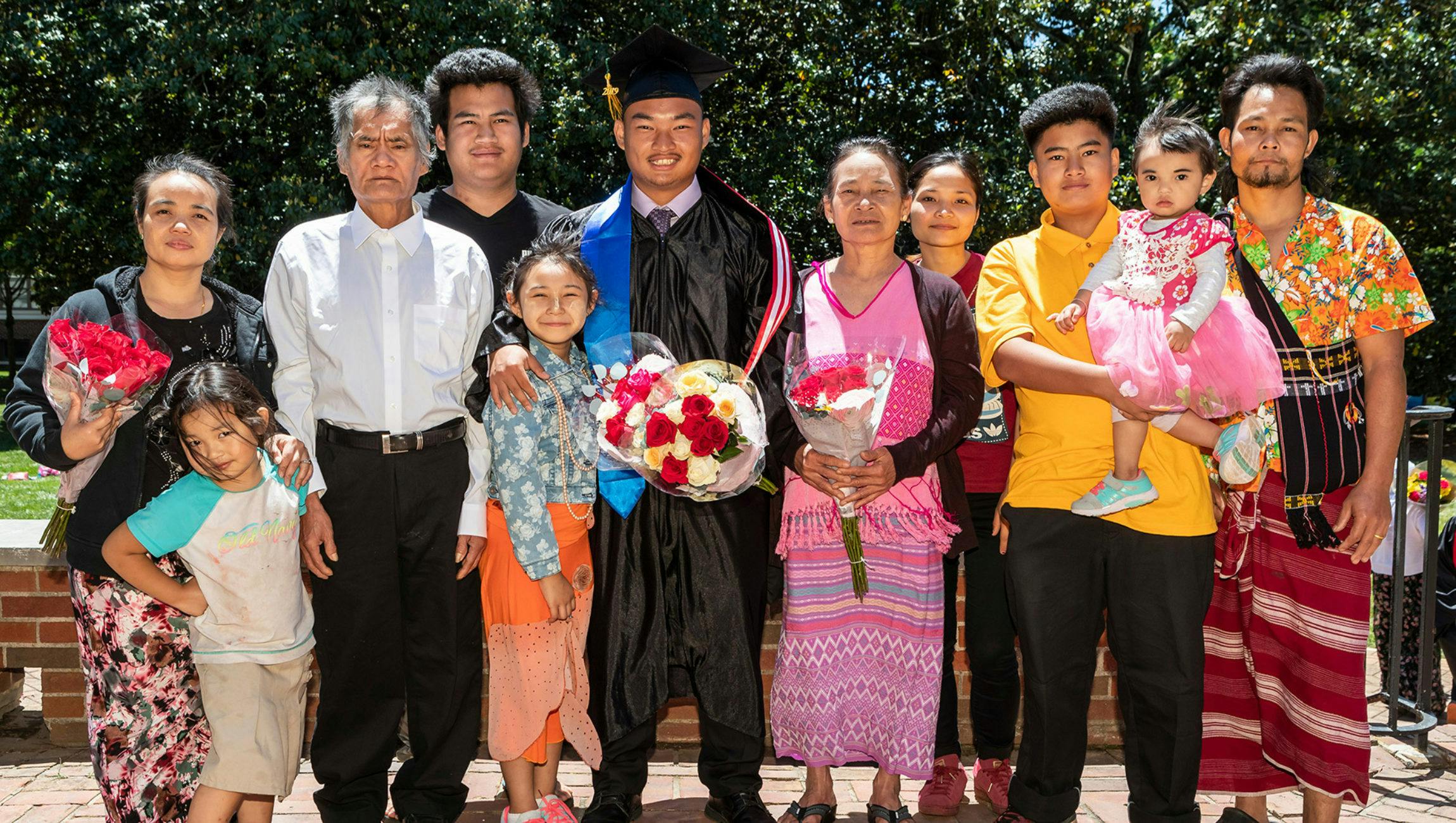 Graduating seniors and their families at the Fugees Academy in Clarkston, Georgia, in 2019. Credit: Clyde Click